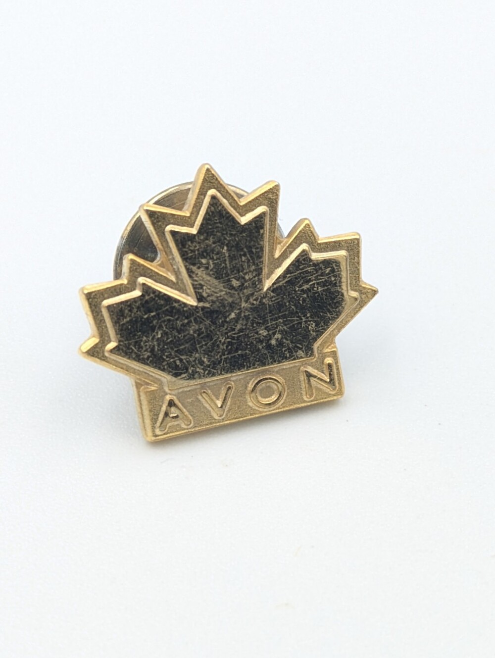 Vintage Avon signed Birks gold tone lapel pin maple leaf Canada